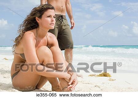 A couple on a beach View Large Photo Image Stock Photography - A couple on a beach. Fotosearch