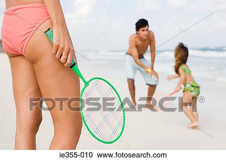 A family playing tennis View Large Photo Image Stock Image - A family playing tennis. Fotosearch