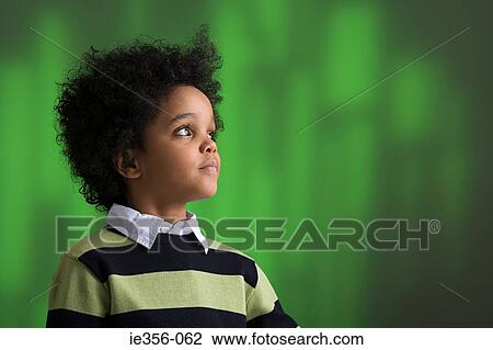 Stock Image - Boy thinking. Fotosearch