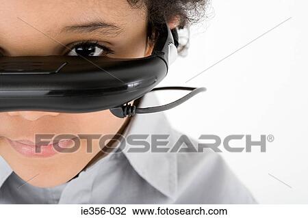 Boy wearing virtual reality headset View Large Photo Image Stock Image - Boy wearing virtual reality headset. Fotosearch