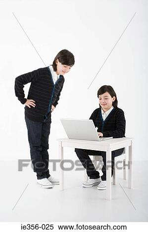 Boy with avatar of himself View Large Photo Image Stock Photography - Boy with avatar of himself. Fotosearch