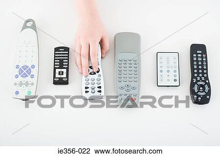 Child with remote controls View Large Photo Image Stock Image - Child with remote controls. Fotosearch