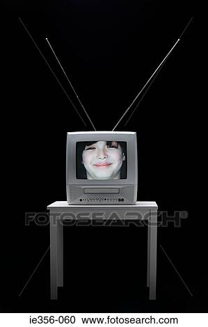 Face of a boy on television View Large Photo Image Stock Image - Face of a boy on television. Fotosearch