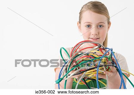 Girl holding cables View Large Photo Image Stock Image - Girl holding cables. Fotosearch
