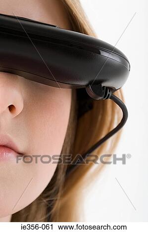 Girl wearing virtual reality headset View Large Photo Image Stock Image - Girl wearing virtual reality headset. Fotosearch