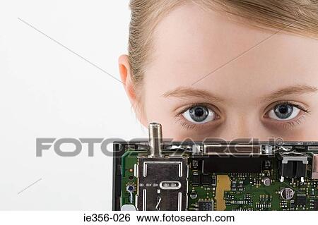 Girl with a circuit board View Large Photo Image Stock Photograph - Girl with a circuit board. Fotosearch