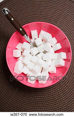 A bowl of sugar cubes and a spoon View Large Photo Image Stock Image - A bowl of sugar cubes and a spoon. Fotosearch
