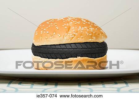 A tyre in a burger View Large Photo Image Picture - A tyre in a burger. Fotosearch