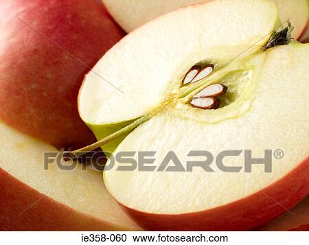 Stock Image - Apple cut in half. Fotosearch