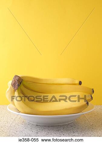 Bananas in a bowl View Large Photo Image Stock Photography - Bananas in a bowl. Fotosearch
