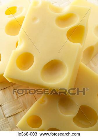 Stock Image - Slices of cheese. Fotosearch