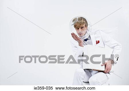 A man wearing a goldfish bowl View Large Photo Image Stock Photography - A man wearing a goldfish bowl. Fotosearch