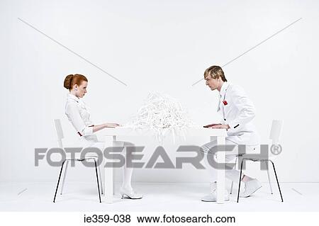 Stock Photo - Businesspeople face to face. Fotosearch