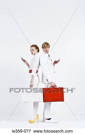 Portrait of businesspeople using their cell phones View Large Photo Image Stock Photo - Portrait of businesspeople using their cell phones. Fotosearch