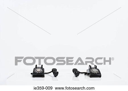 Two telephones View Large Photo Image Stock Photo - Two telephones. Fotosearch