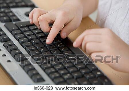 Child typing View Large Photo Image Stock Photo - Child typing. Fotosearch