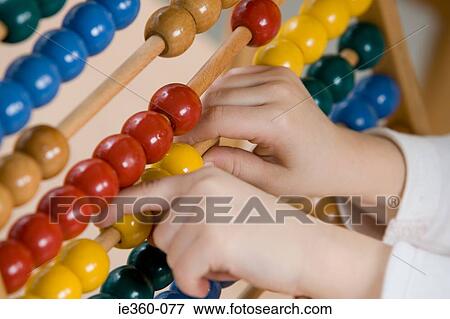 Child with abacus View Large Photo Image Stock Photo - Child with abacus. Fotosearch