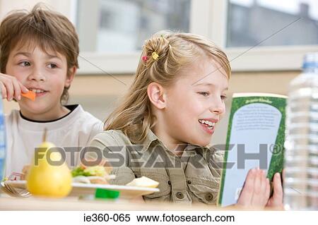 Children having lunch break View Large Photo Image Stock Photography - Children having lunch break. Fotosearch