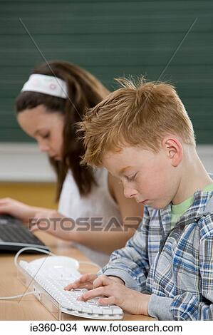 Children typing View Large Photo Image Picture - Children typing. Fotosearch
