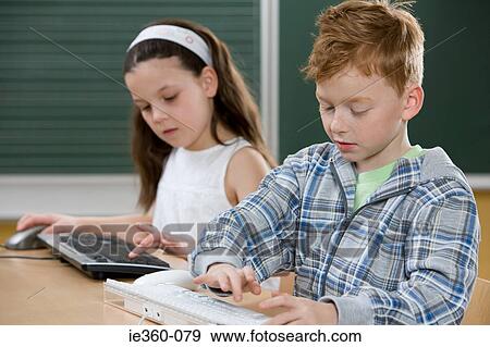 Children typing View Large Photo Image Stock Photo - Children typing. Fotosearch