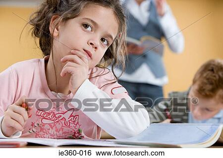 Girl in class View Large Photo Image Stock Photograph - Girl in class. Fotosearch