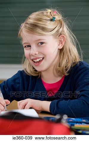 Girl in classroom View Large Photo Image Stock Photo - Girl in classroom. Fotosearch