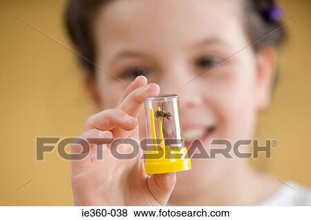Girl with an insect View Large Photo Image Stock Photo - Girl with an insect. Fotosearch