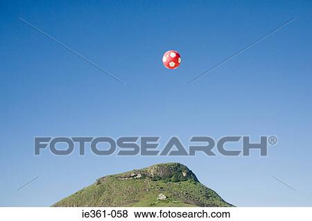 A football in mid air View Large Photo Image Stock Photo - A football in mid air. Fotosearch