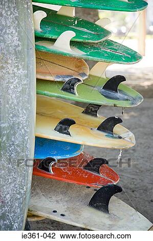 Stock Image - A stack ogf surfboards. Fotosearch