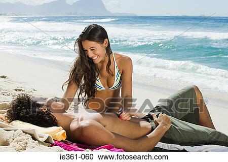 A teenage couple on the beach View Large Photo Image Stock Image - A teenage couple on the beach. Fotosearch
