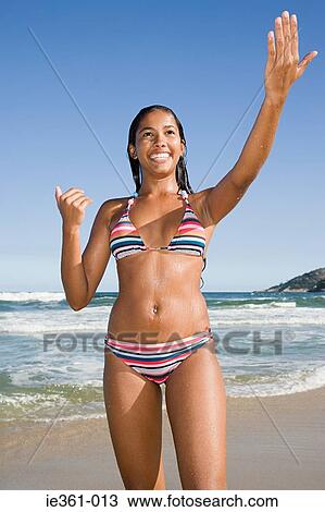 A teenage girl on a beach View Large Photo Image Stock Image - A teenage girl on a beach. Fotosearch