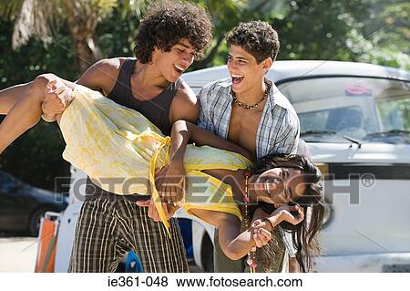 Teenagers fooling around View Large Photo Image Stock Photo - Teenagers fooling around. Fotosearch