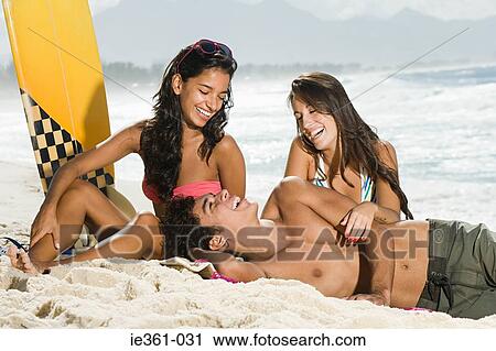 Teenagers on the beach View Large Photo Image Stock Image - Teenagers on the beach. Fotosearch