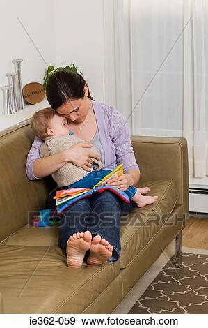 A mother comforting her son View Large Photo Image Stock Photo - A mother comforting her son. Fotosearch