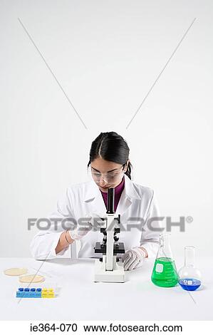 Scientist with microscope View Large Photo Image Stock Image - Scientist with microscope. Fotosearch