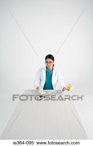 Stock Photography - Scientist with model car. Fotosearch
