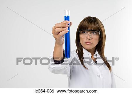 Stock Photography - Scientist with test tube. Fotosearch
