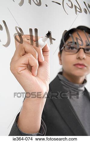 Scientist writing formula View Large Photo Image Picture - Scientist writing formula. Fotosearch