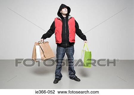 Man with bags View Large Photo Image Stock Image - Man with bags. Fotosearch