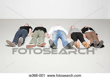 People lying down View Large Photo Image Stock Image - People lying down. Fotosearch