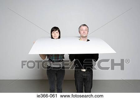 People with heads in board View Large Photo Image Stock Image - People with heads in board. Fotosearch