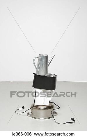Stock Photograph - Stack of household objects. Fotosearch