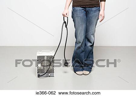Woman holding cable View Large Photo Image Stock Image - Woman holding cable. Fotosearch