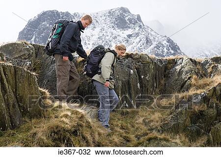 Stock Image - A couple hiking. Fotosearch