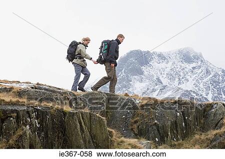Stock Photo - A couple hiking. Fotosearch