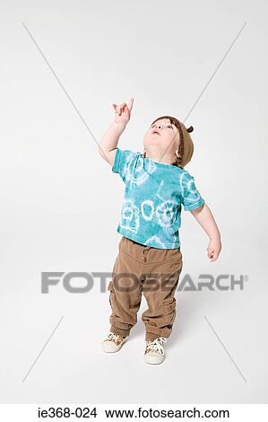 A boy pointing View Large Photo Image Picture - A boy pointing. Fotosearch