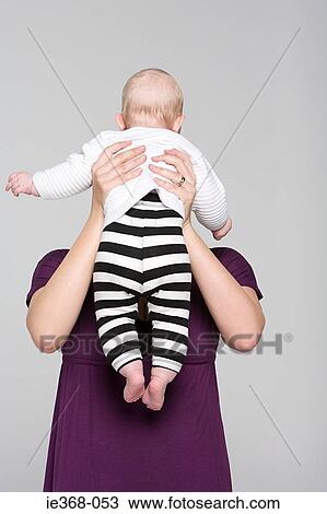 A mother and baby girl View Large Photo Image Stock Image - A mother and baby girl. Fotosearch