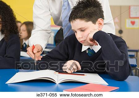 Boy and teacher View Large Photo Image Stock Photography - Boy and teacher. Fotosearch