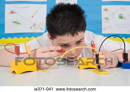 Boy in science lesson View Large Photo Image Stock Image - Boy in science lesson. Fotosearch