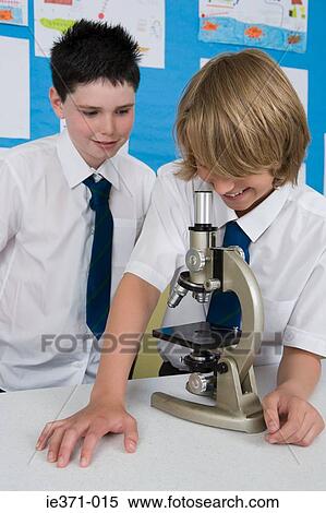 Boys with microscope View Large Photo Image Stock Photography - Boys with microscope. Fotosearch
